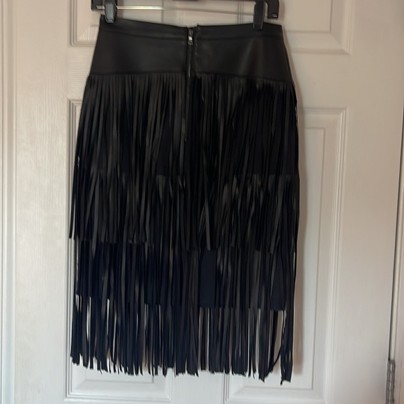 Awesome faux leather skirt with faux leather fringe by BCBG - Picture 2 of 4